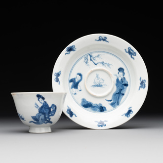 A Chinese blue and white 'Long Eliza and playing boy' cup and saucer, Qi Yu Mei Zhi 奇玉美製 and Bi Yu Tang Zhi 璧玉堂製, Kangxi