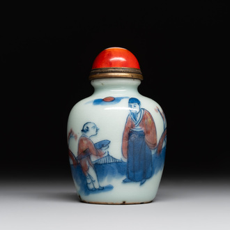 A Chinese blue, white and copper-red snuff bottle, 19th C.