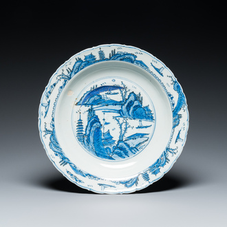 A fine Chinese blue and white 'mountainous landscape' dish, Jiajing