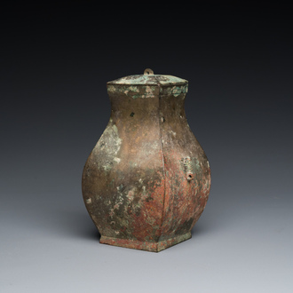 A Chinese bronze ritual wine vessel and cover, 'fang hu 方壺', Warring States Period