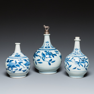 Three Japanese blue and white Arita 'birds among flowering branches' pharmacy bottles, Edo, 18th C.