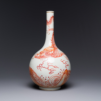 A Chinese iron-red gilt-decorated 'dragon and carp' bottle vase, 19/20th C.