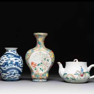 A Chinese blue and white 'dragon' vase, a famille rose 'millefleurs' vase and a teapot, Qianlong mark, 19/20th C.