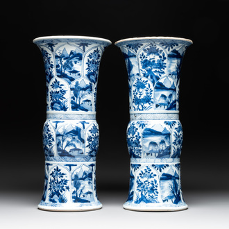 Two Chinese blue and white 'gu' vases with landscape and floral panels, Kangxi