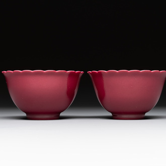 A pair of Chinese ruby-glazed bowls, Qianlong mark, 19/20th C.