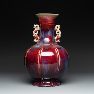 A Chinese flambé-glazed vase with archaistic dragon handles, 19th C.