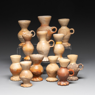 Twelve Siegburg stoneware funnel beakers, 15/16th C.