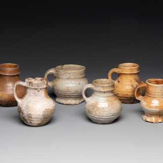 A collection of six German stoneware mugs, 16/17th C.