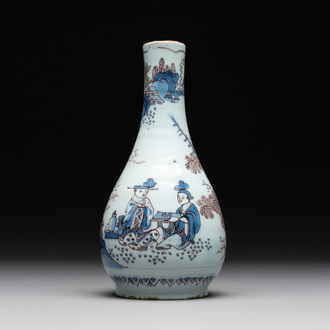 A Dutch Delft blue, white and manganese chinoiserie bottle vase, late 17th C.