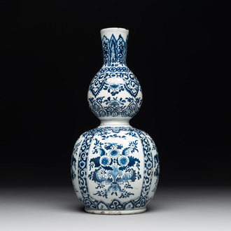 A Dutch Delft blue and white double gourd vase, Pieter Kam, ca. 1700