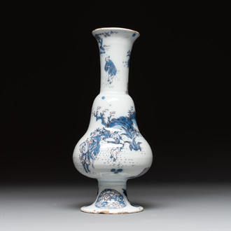 A Dutch Delft blue, white and manganese pear-shaped chinoiserie vase, late 17th C.
