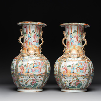 A pair of Chinese Canton famille rose vases with narrative design, 19th C.