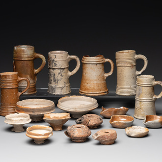 A 18-piece study collection of stoneware mugs, drinking vessels, pottery and stoneware oil lamps, mainly Germany, 15th C. and later