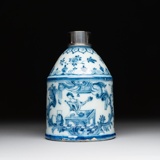 A Dutch Delft blue and white tea caddy with a pipe smoker, 18th C.
