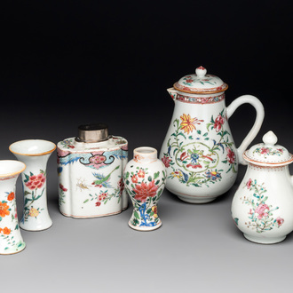 A Chinese famille rose tea caddy, two covered milk jugs and three vases, Yongzheng/Qianlong