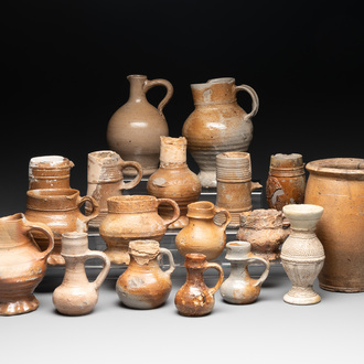 18 German stoneware jugs, mugs and vessels, 15th C. and later