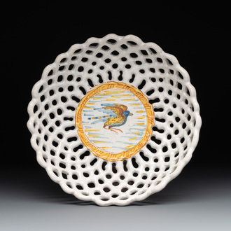 A reticulated Italian blue, white and yellow 'bird' bowl, Italy, Faenza or Deruta, 17th C.