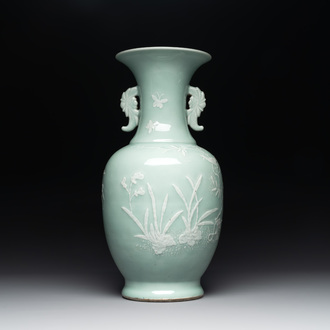 A Chinese slip-decorated celadon-glazed vase with floral design, Qianlong mark and of the period