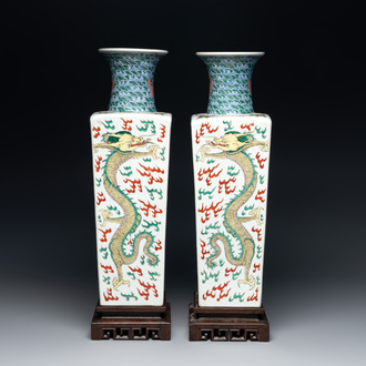 A pair of Chinese famille verte 'dragon' vases and wooden stands, Chenghua mark, 19th C.