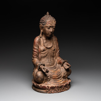 A Southeast Asian gilt-lacquered wooden sculpture of a praying ascetic, 18/19th C.