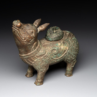A rare Chinese inscribed bronze tapir-form vessel and cover, 'xizun 犧尊', late Ming/early Qing