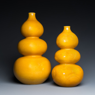 Two Chinese incised yellow-glazed triple gourd vases with dragons and lotus scrolls, Longqing mark, 20th C.