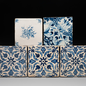 Five blue and white Dutch Delft tiles with floral design, 17th C.