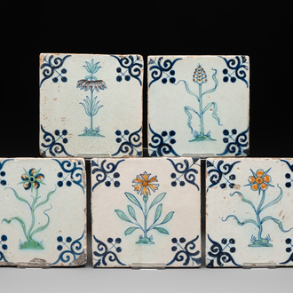 Five polychrome Dutch Delft 'flower' tiles, 17th C.