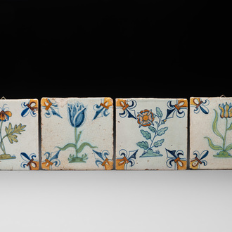 Four polychrome Dutch Delft 'flower' tiles, 17th C.