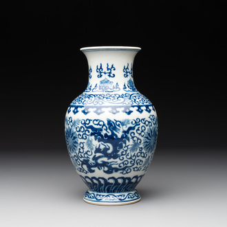 A Chinese blue and white 'phoenix and flower scroll' vase, Qianlong mark, 19th C.