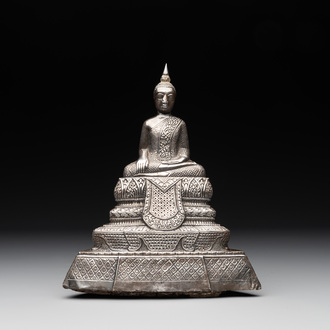 A Cambodian silver repoussé Buddha with inscription, 19th C.