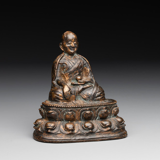 A Tibetan bronze Padmasambhava, 14th C.