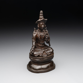 A Vietnamese bronze deity on a lotus throne, 18/19th C.