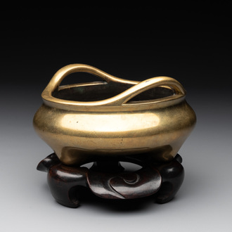 A Chinese bronze tripod censer on a wooden stand, Song Zhu Xuan 松竹軒 mark, 18th C.