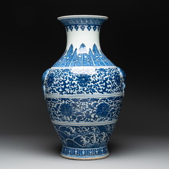 A large Chinese blue and white 'flower scroll' vase, Qianlong mark, 19th C.