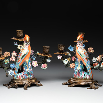 A pair of candle holders mounted with Chinese famille rose models of pheasants, Qianlong