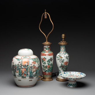 A Chinese famille verte covered jar, two vases mounted as lamps and a tazza, 19th C.