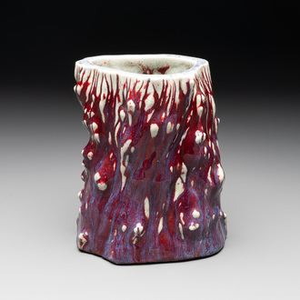 A Chinese flambé-glazed trunk-shaped brush pot, 19th C.
