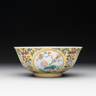 A Chinese blue, white and famille rose bowl with floral design, Qianlong mark, 19/20th C.