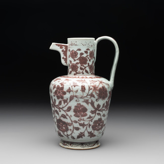 A Chinese copper-red and white 'flower scroll' ewer, Ming or later