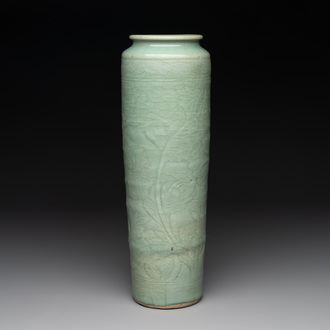 A Chinese Longquan celadon cylindrical vase with incised floral design, Ming