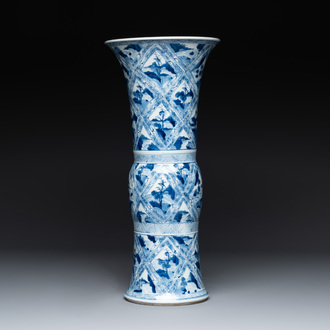 A Chinese blue and white 'landscape' 'gu' vase, Kangxi