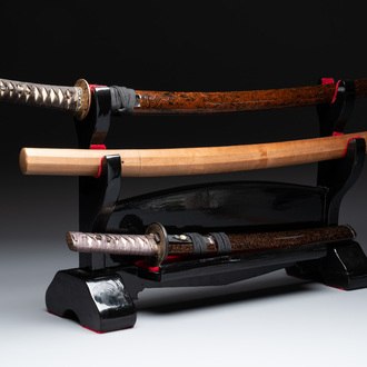 A collection of fine Japanese sword handles, guards, sheaths, a sword and a lacquered stand, Edo, 18/19th C.