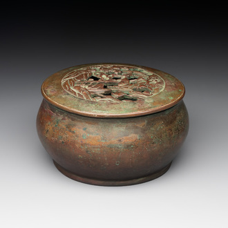 A rare Chinese bronze 'sage in a mountainous landscape' handwarmer, 17/18th C.