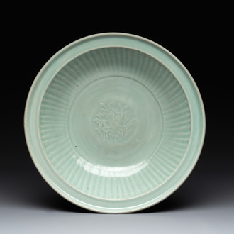 A Chinese Longquan celadon 'lotus' dish, Ming