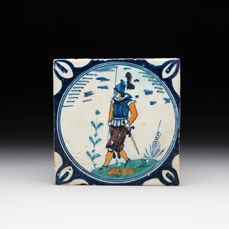 A polychrome Dutch Delft maiolica 'medallion' 'soldier' tile, late 16th C.