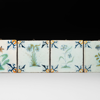 Four polychrome Dutch Delft 'flower' tiles, 17th C.