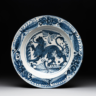 A rare Spanish blue and white pottery 'lion' dish from the 'mariposas' series, Puente del Arzobispo, Toledo, 16th C.