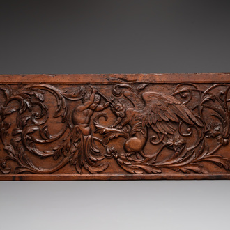 A carved walnut panel depicting the victory of good over evil, 16th C.
