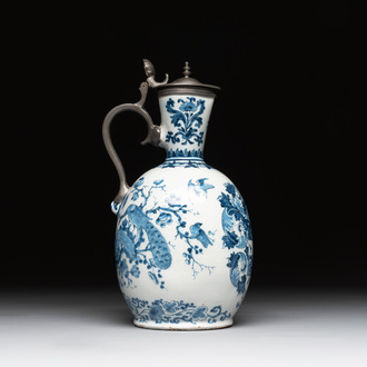A Dutch Delft blue and white pewter-mounted armorial jug, late 17th C.